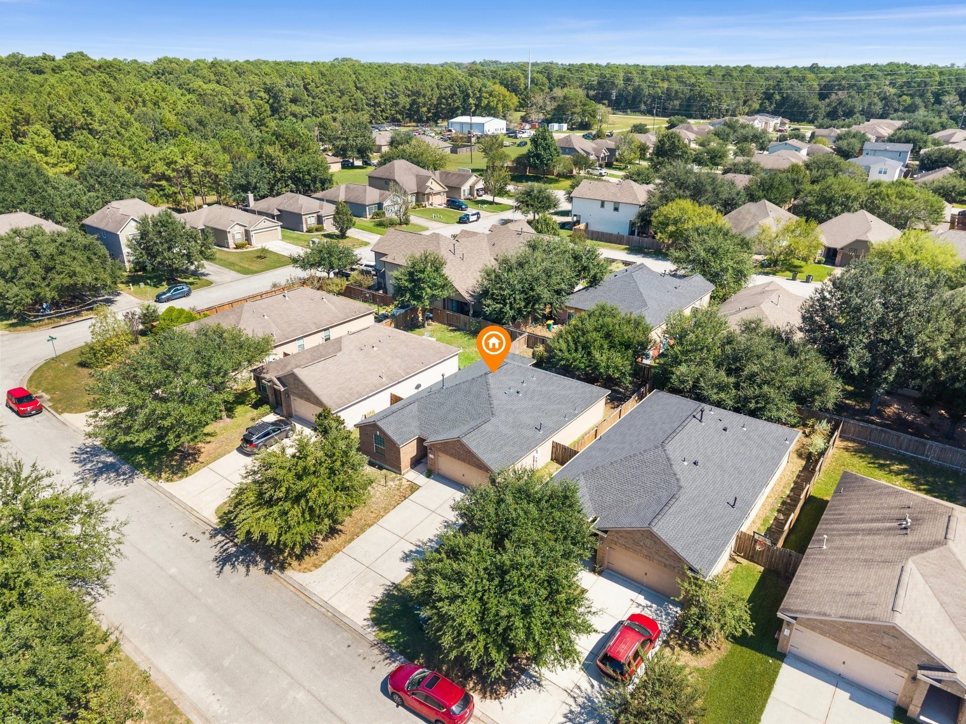 305 Pine Mist Lane, Conroe, TX 77304 A closer look at this single story home with its attached 2 car garage and established neighborhood setting.