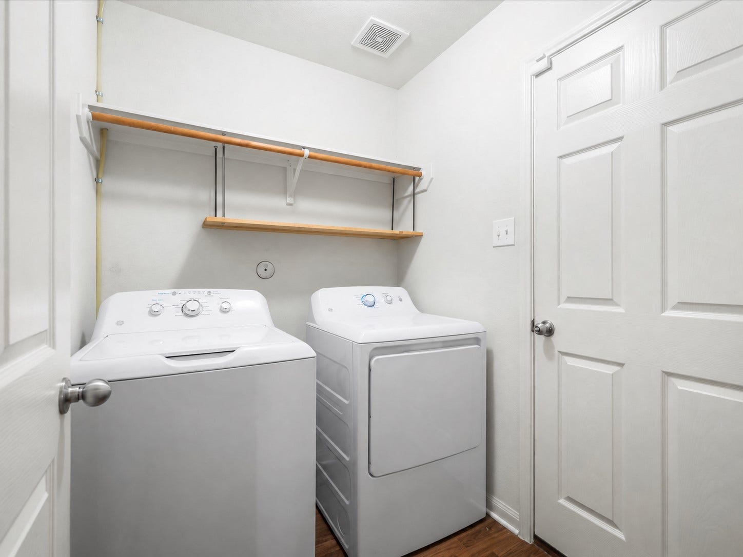 305 Pine Mist Lane, Conroe, TX 77304 A dedicated interior laundry room with overhead shelving. Washer and dryer are included!