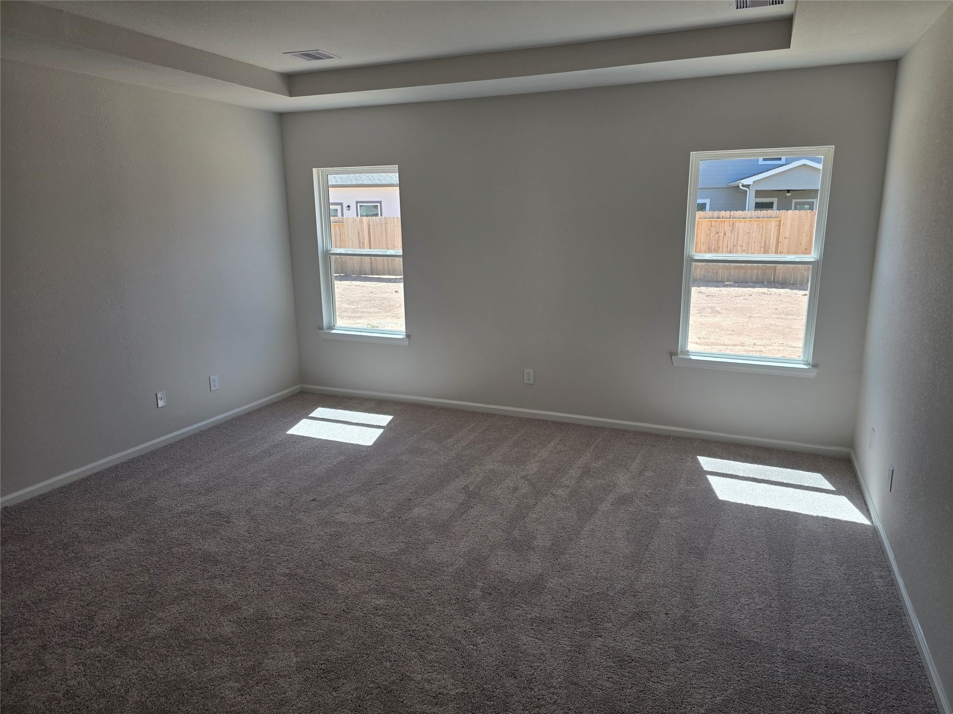 1920 N Riverside Circle, Dayton, TX 77535 The Shetland III- Primary Suite, Tray Ceiling not Included. Home under construction, photo used for illustrative purposes only, colors and options will vary.