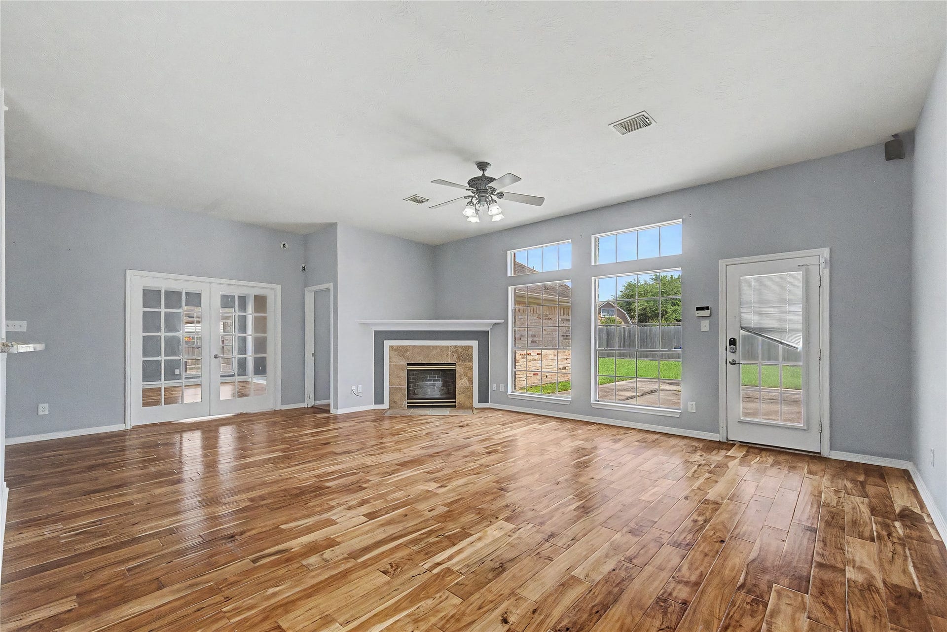 3615 Turtle Cove Drive, Pasadena, TX 77505 LARGE & SPACIOUS FAMILY ROOM WITH CORNER GAS FIREPLACE-PLENTY OF NATURAL LIGHT THROUGH THE LARGE WINDOWS