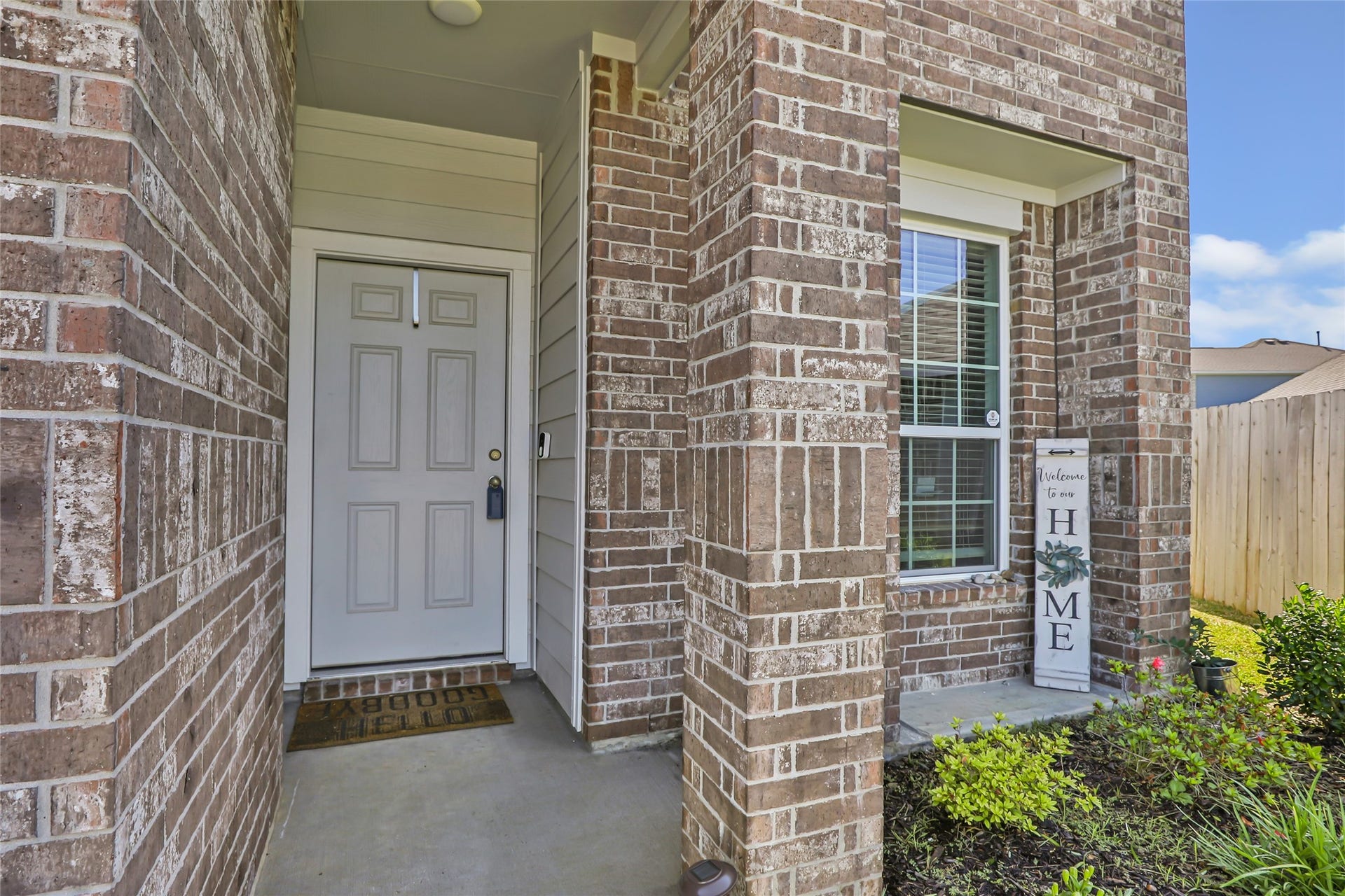 Charming entrance with inviting curb appeal.