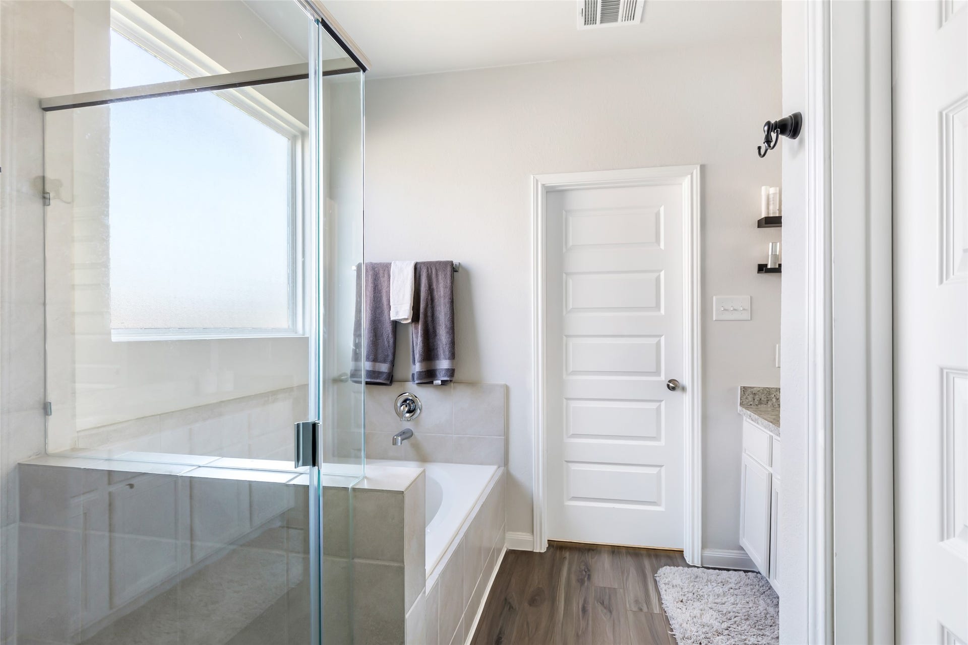 Spacious walk-in closet for ample storage.