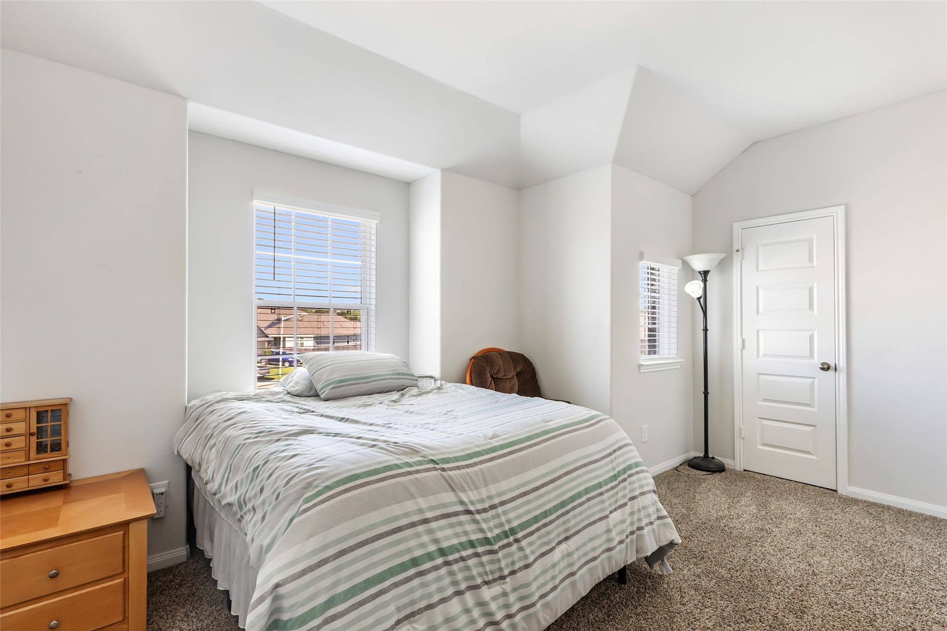 Spacious bedroom with abundant closet space.