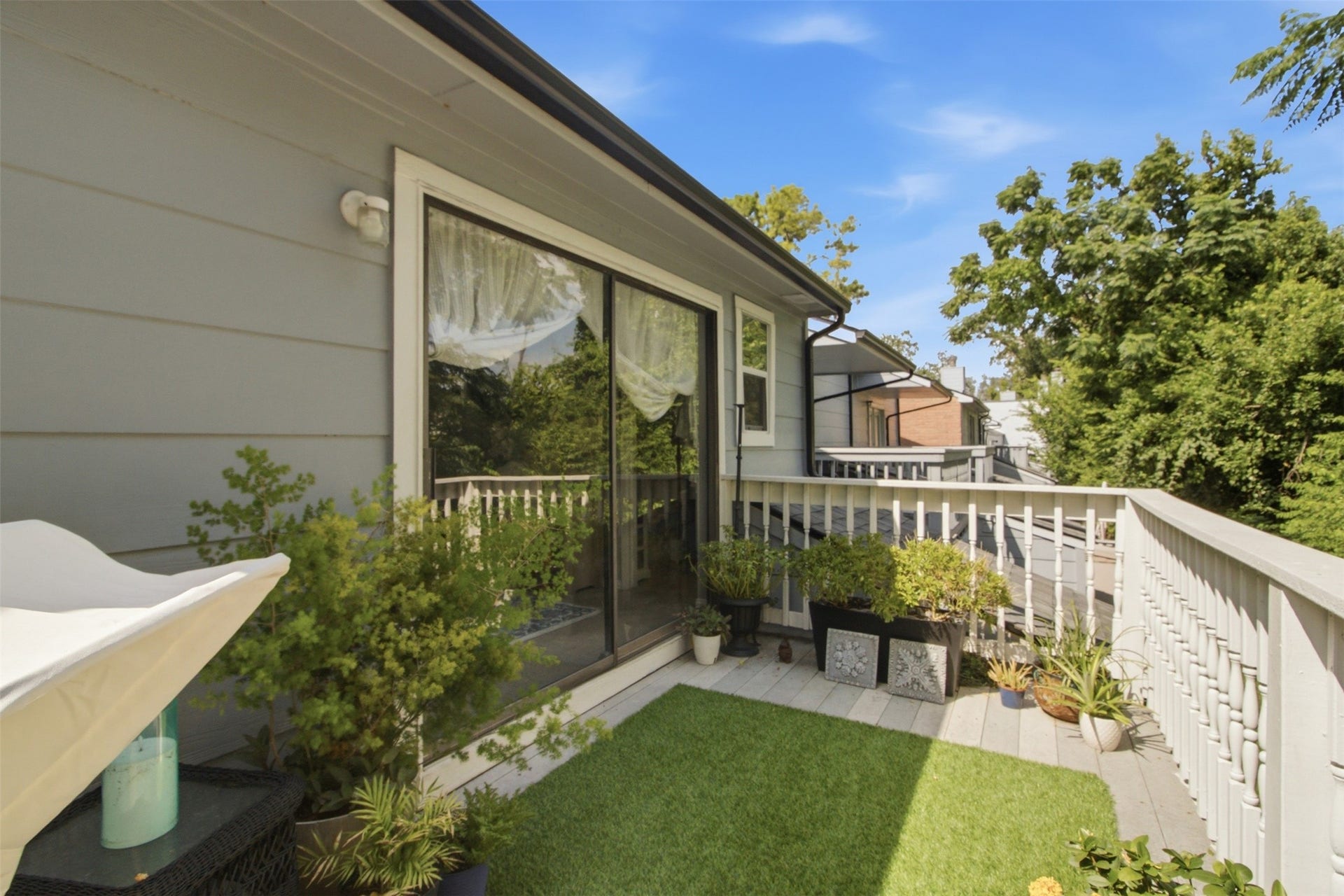 Enjoy the serene nature views on the patio, less than 15 minutes from Downtown Houston.