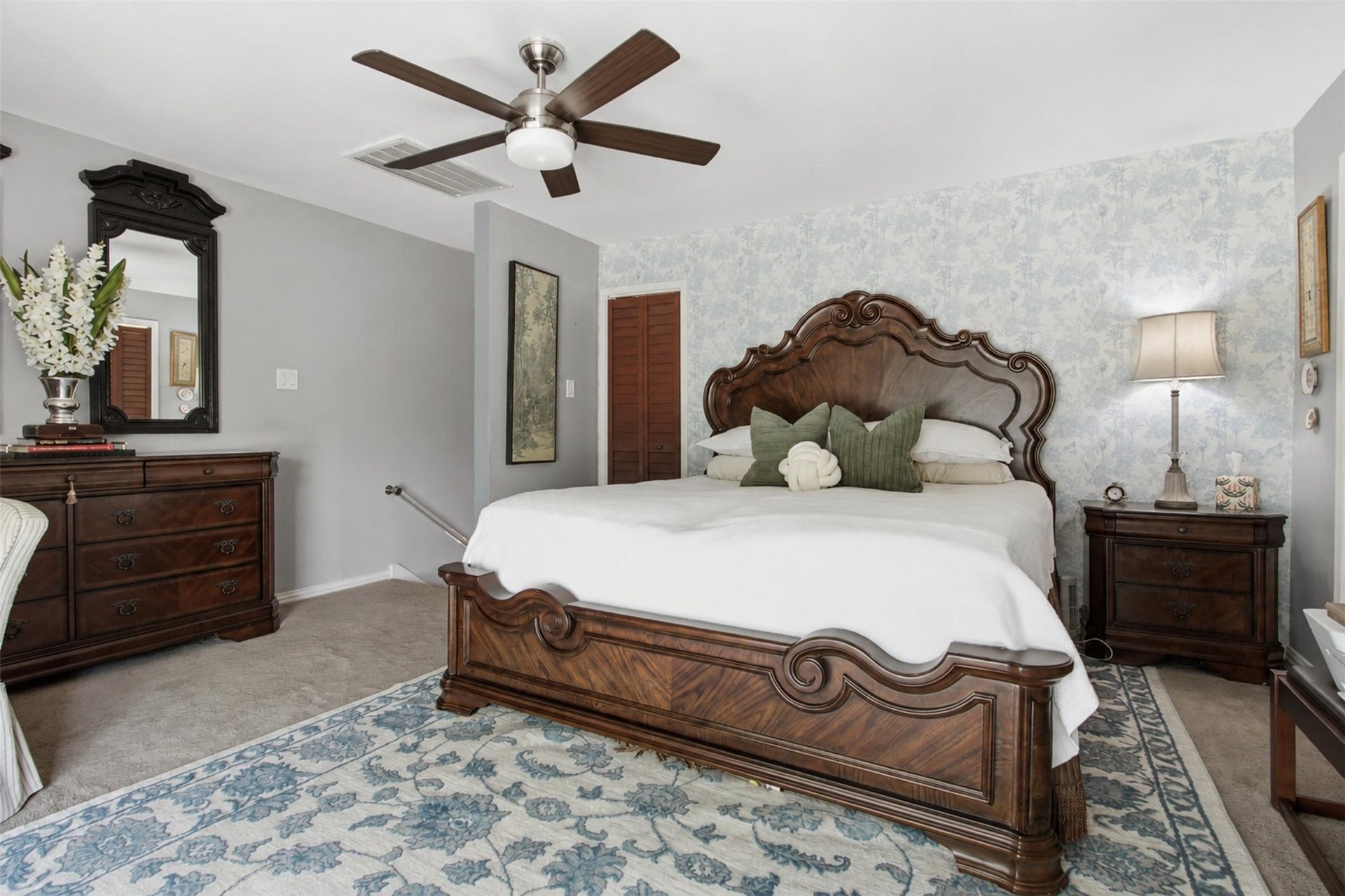 The stairs lead directly into the primary bedroom.