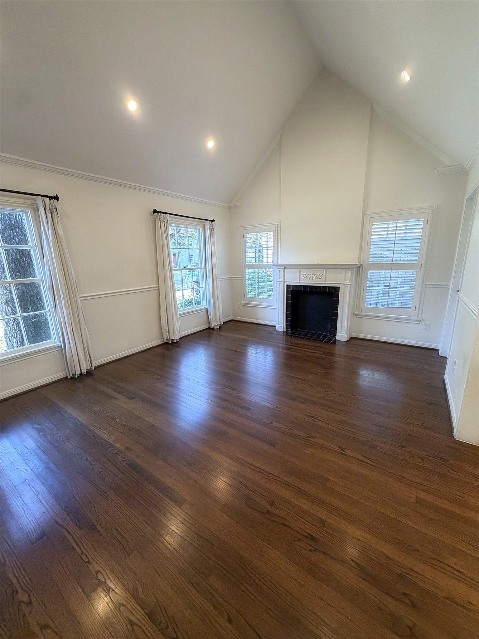 Alternate View of living room - Spacious gathering area with comfortable seating, neutral dcor, and abundant natural light.