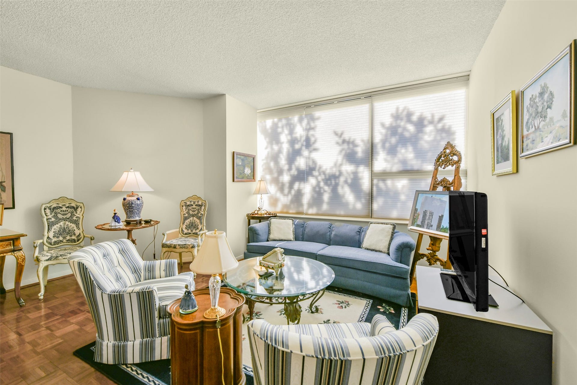 15 Greenway Plaza, #3B, Houston, TX 77046 Parquet floors flow throughout the living and dining area.