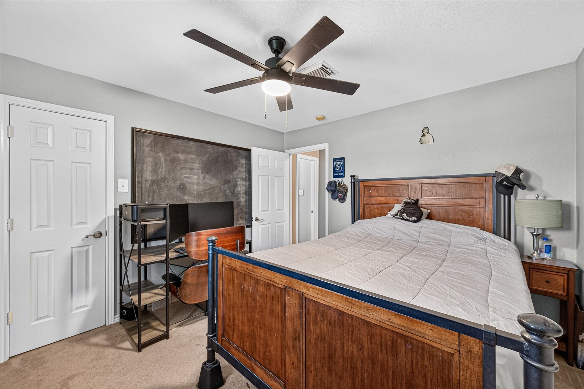 Second bedroom is beside the upstairs bathroom in the hallway