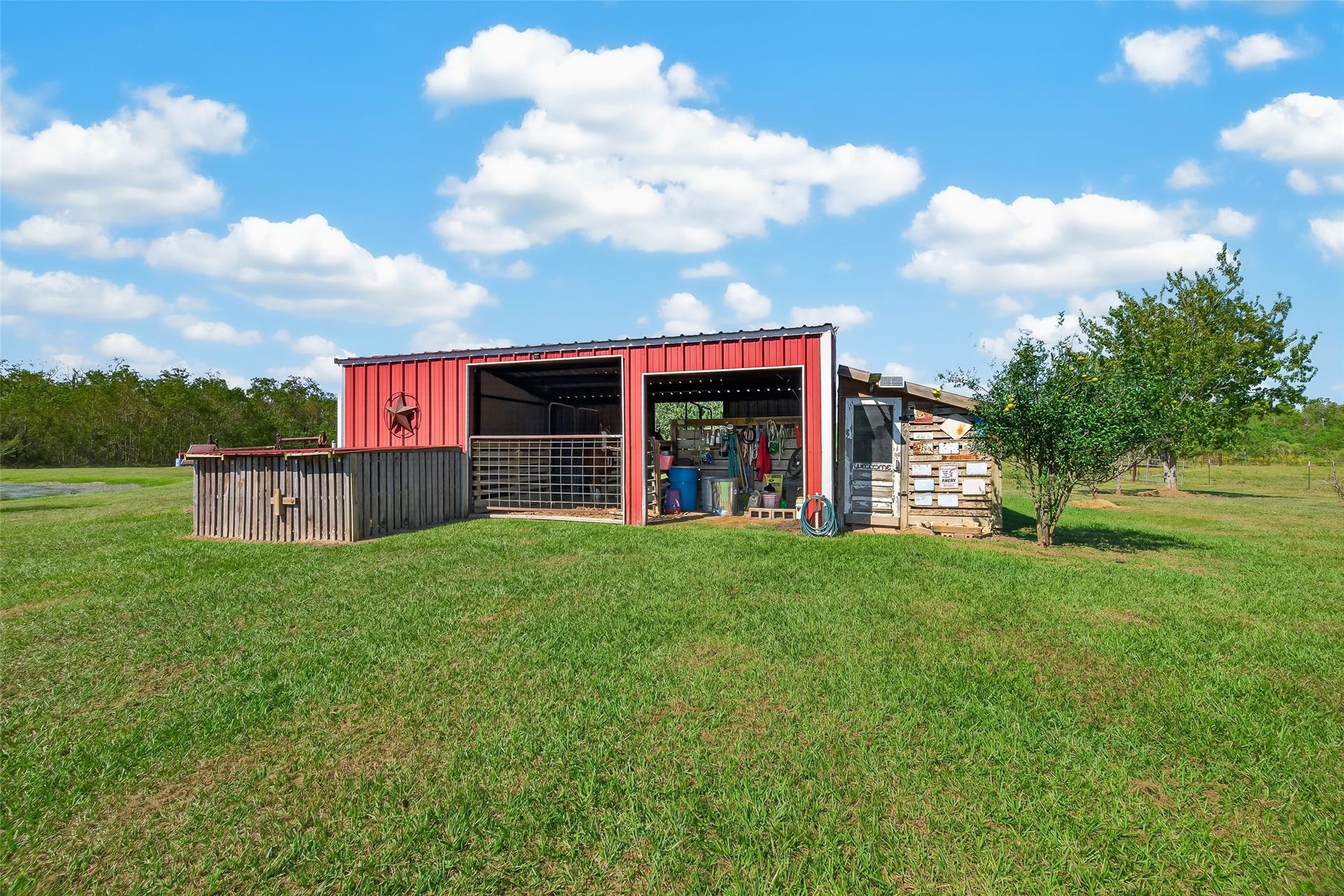 Barn is complete with a tack room and has separate chicken coops
