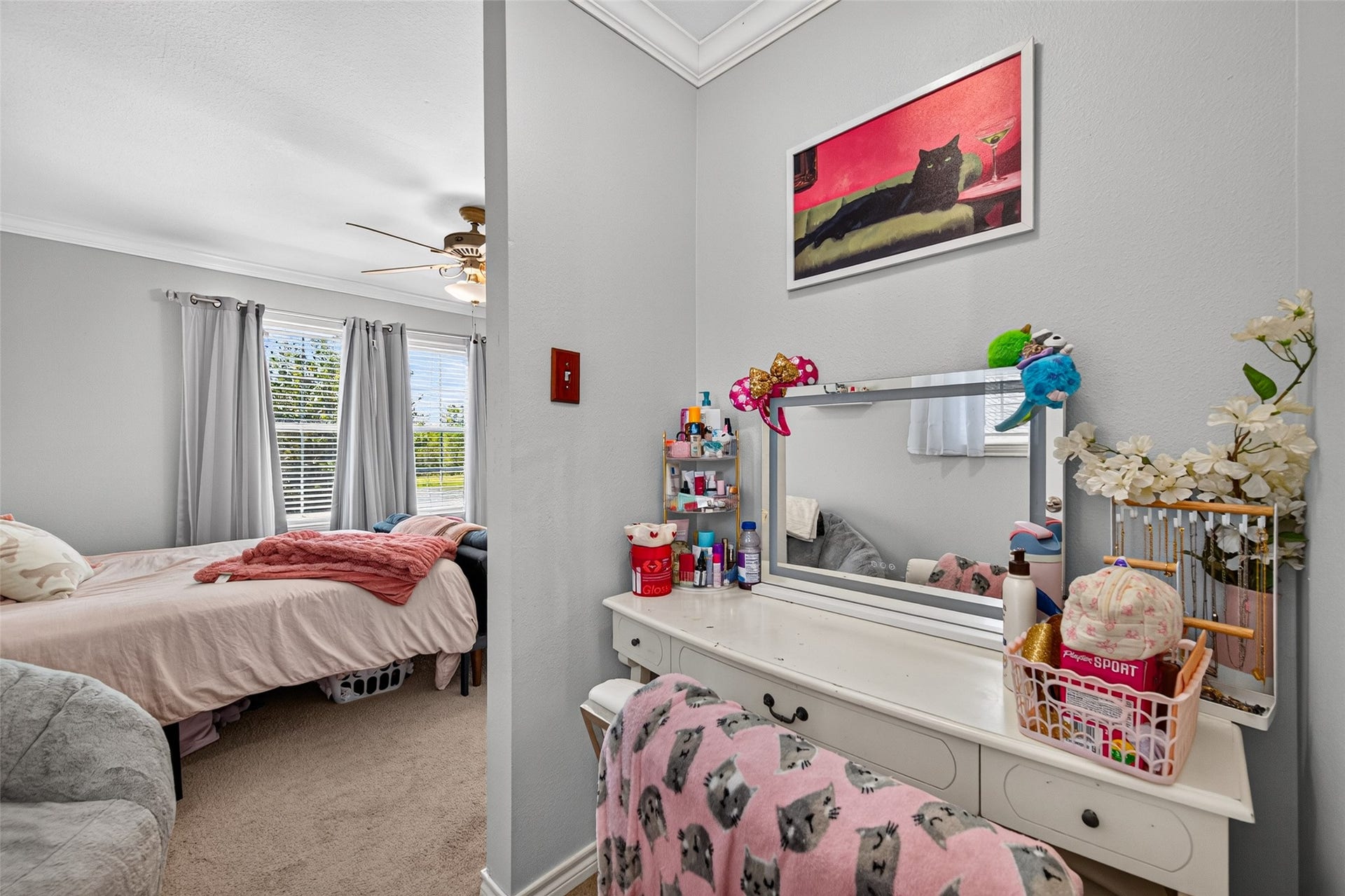 First bedroom has an adjoining vanity and dressing area, offering convenient space for personal storage