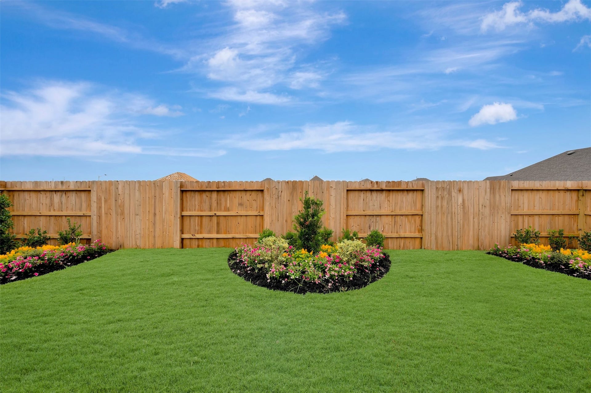 564 Day Station Drive, Dayton, TX 77535 Amazing backyard with lush landscaping