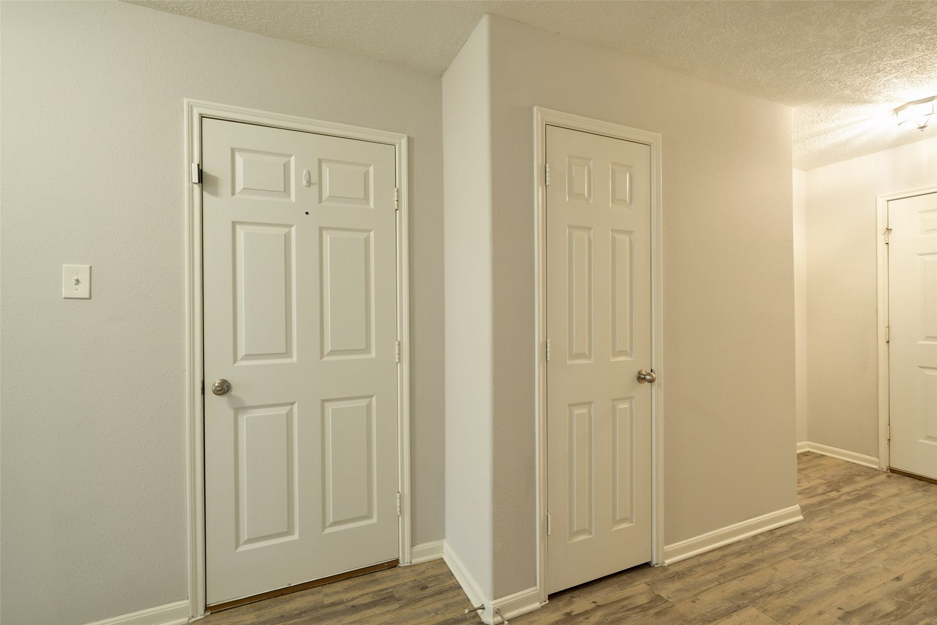 Entry way has storage closet and access to garage.