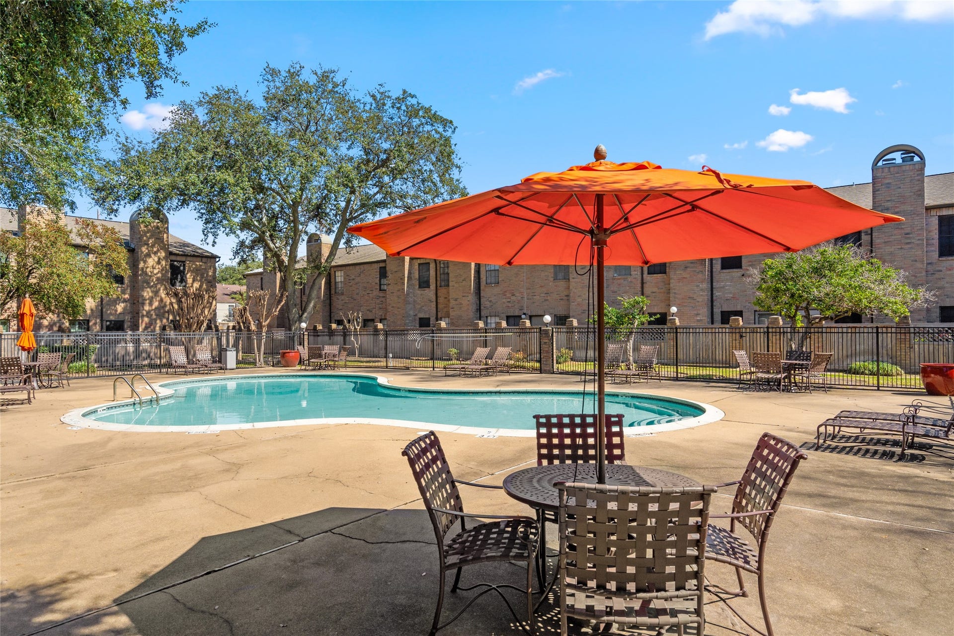9850 Pagewood Lane, #1302, Houston, TX 77042 Relax and unwind at the beautifully maintained community pool! Whether you're soaking up the sun on a lounge chair or cooling off with a refreshing swim, this serene space is perfect for leisure and entertaining. Enjoy the shaded seating areas, lush surroundings, and a peaceful retreat right outside your door!