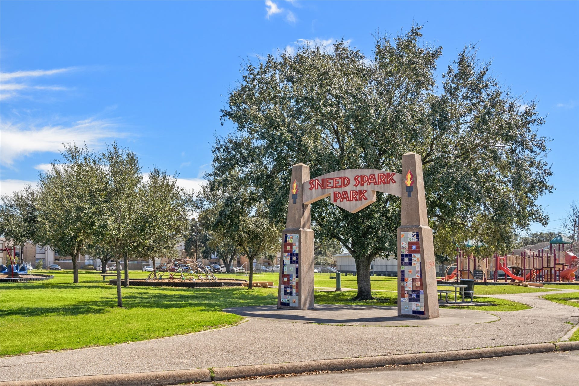 9850 Pagewood Lane, #1302, Houston, TX 77042 Located just minutes from the townhome, Sneed Spark Park offers a beautiful outdoor retreat with lush green spaces, mature trees, and a well-maintained walking path. The park features a colorful playground, open fields, and shaded seating areas, making it perfect for families, fitness enthusiasts, and anyone looking to enjoy the fresh air. A great community space to relax and unwind!