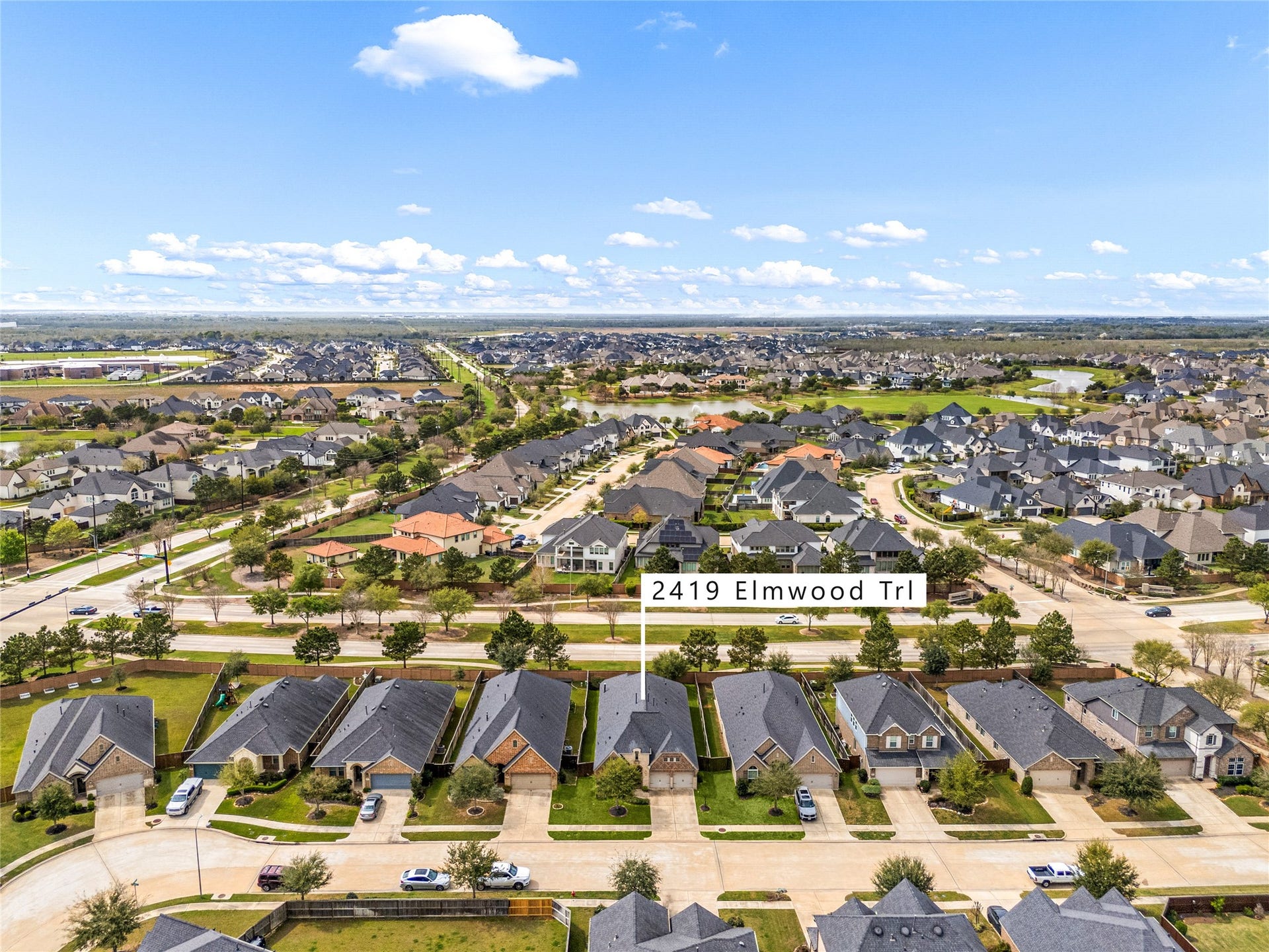 2419 Elmwood Trail, Katy, TX 77493 Beautiful aerial view highlighting the homes location within a well-established neighborhood with convenient access to shopping, dining, and main roads.