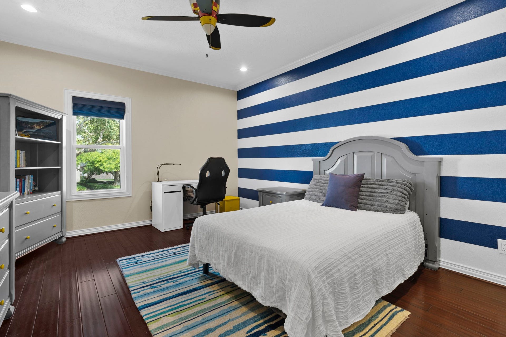 9 Charleston Street S, Sugar Land, TX 77478 One of three spacious second-floor bedrooms.
