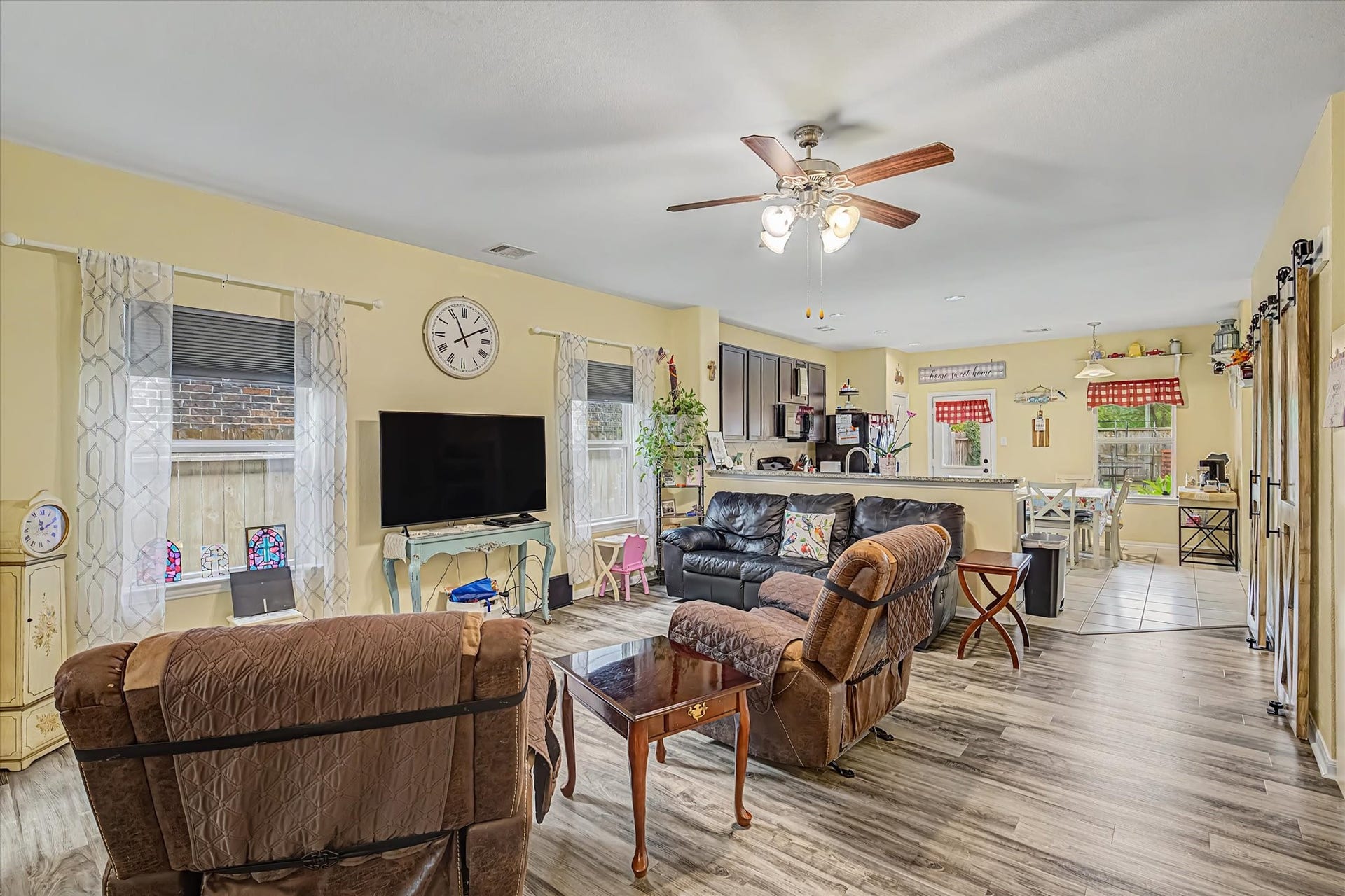 4914 Seaside Sparrow Lane, Baytown, TX 77521 View of the living room with the kitchen in the background
