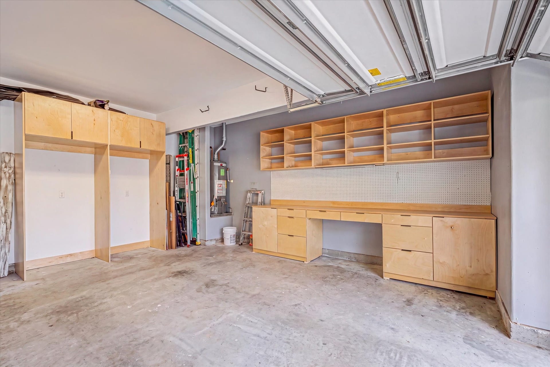 4914 Seaside Sparrow Lane, Baytown, TX 77521 Custom working space in garage with storage