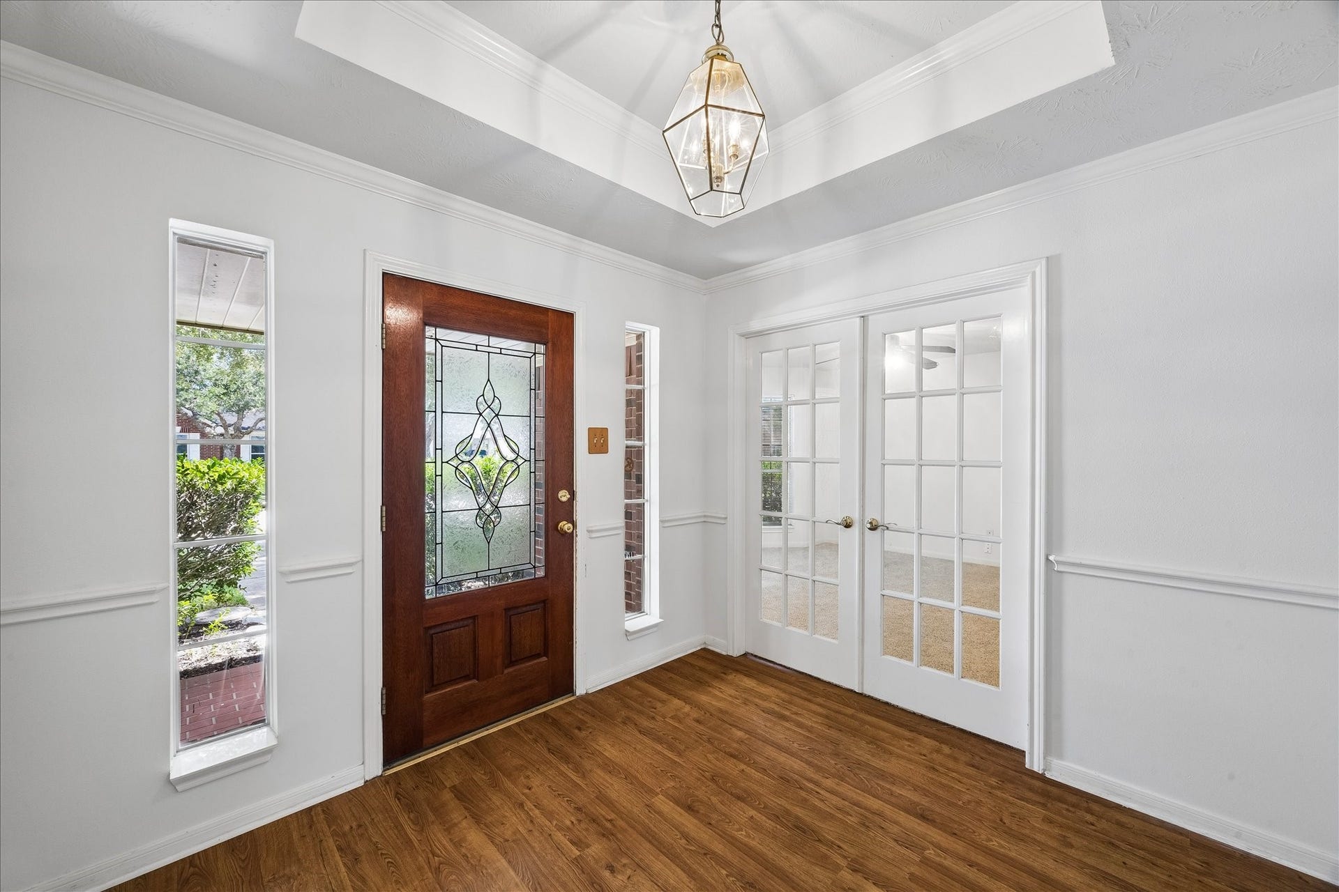 3316 Windfern, Pearland, TX 77581 Entry with side light windows and French doors lead into the office