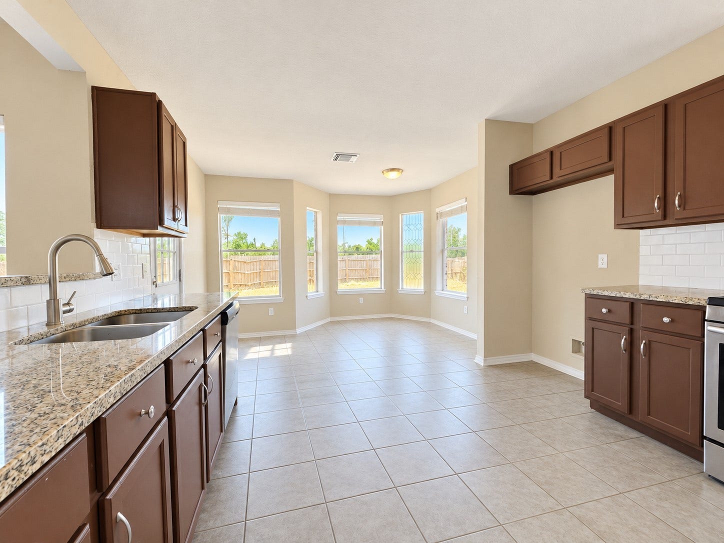 5007 Chase Mountain Drive, Bacliff, TX 77518 Entry into the kitchen and dining area.