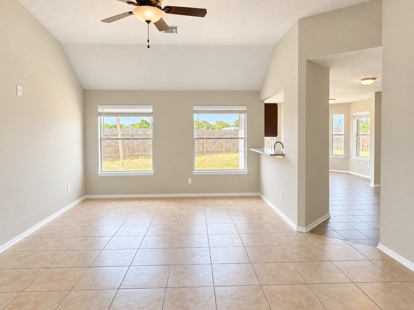 5007 Chase Mountain Drive, Bacliff, TX 77518 Large open family room with vaulted ceilings.