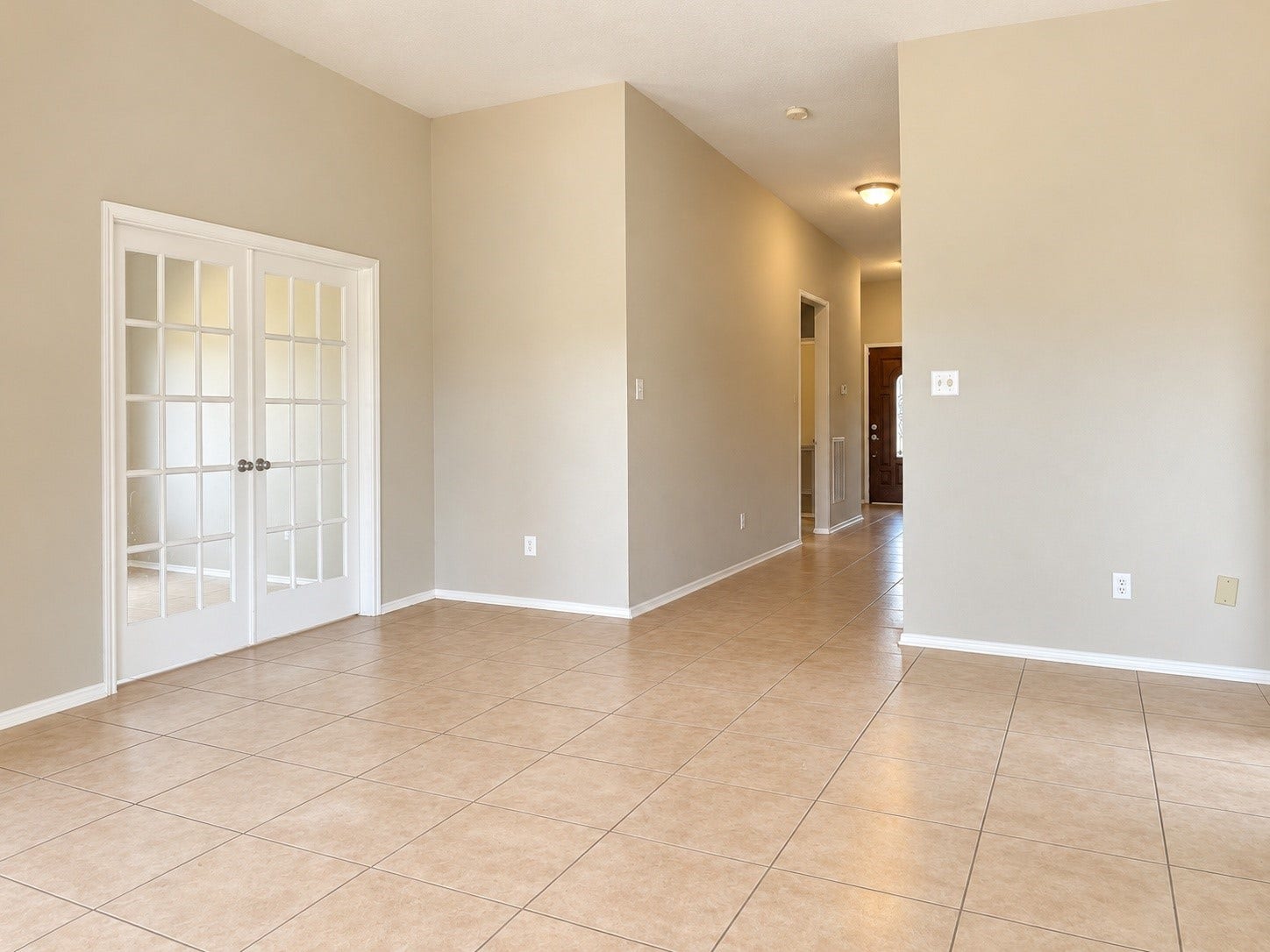 5007 Chase Mountain Drive, Bacliff, TX 77518 Looking back from family room with dedicated office entry on the left.