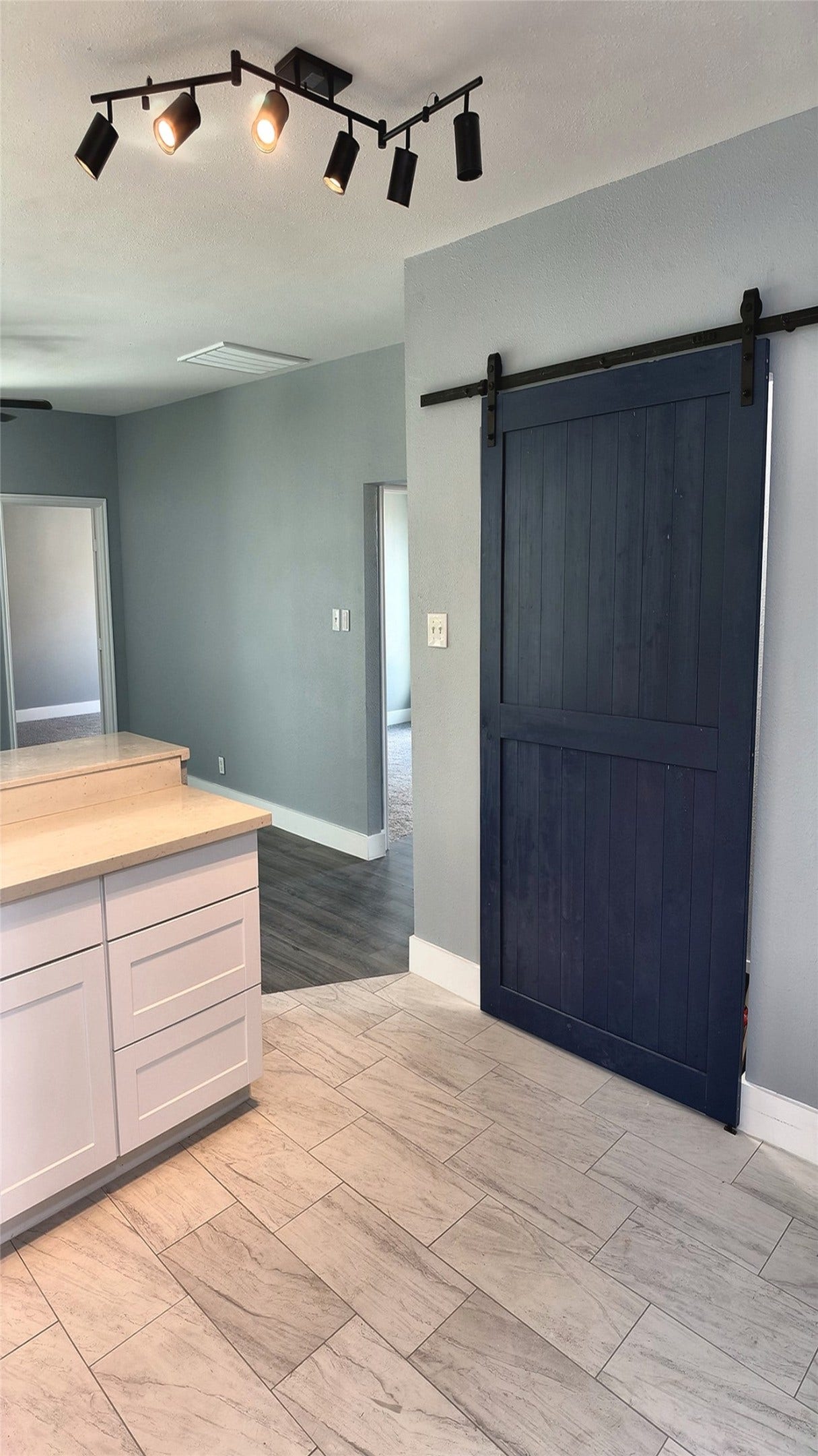 5306 Pickfair Street, Houston, TX 77026 Barn door entry to utility room
