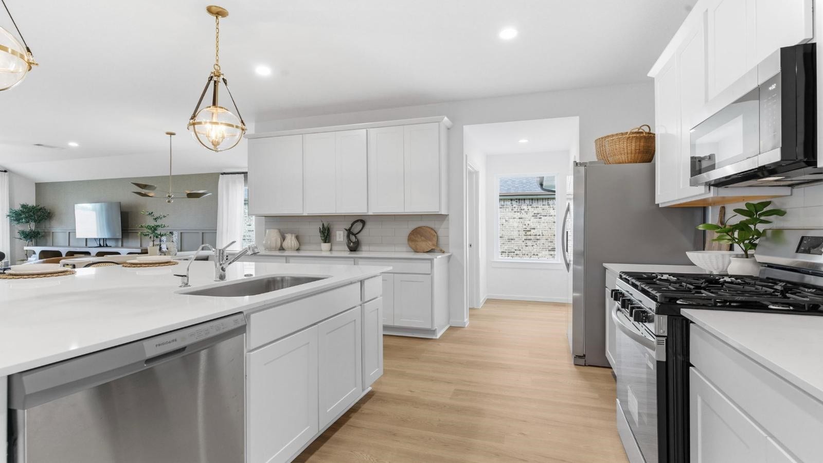 14223 Starboard Reach Drive, Texas City, TX 77510 An open concept kitchen with an island with bar seating and access to the living and dining areas.