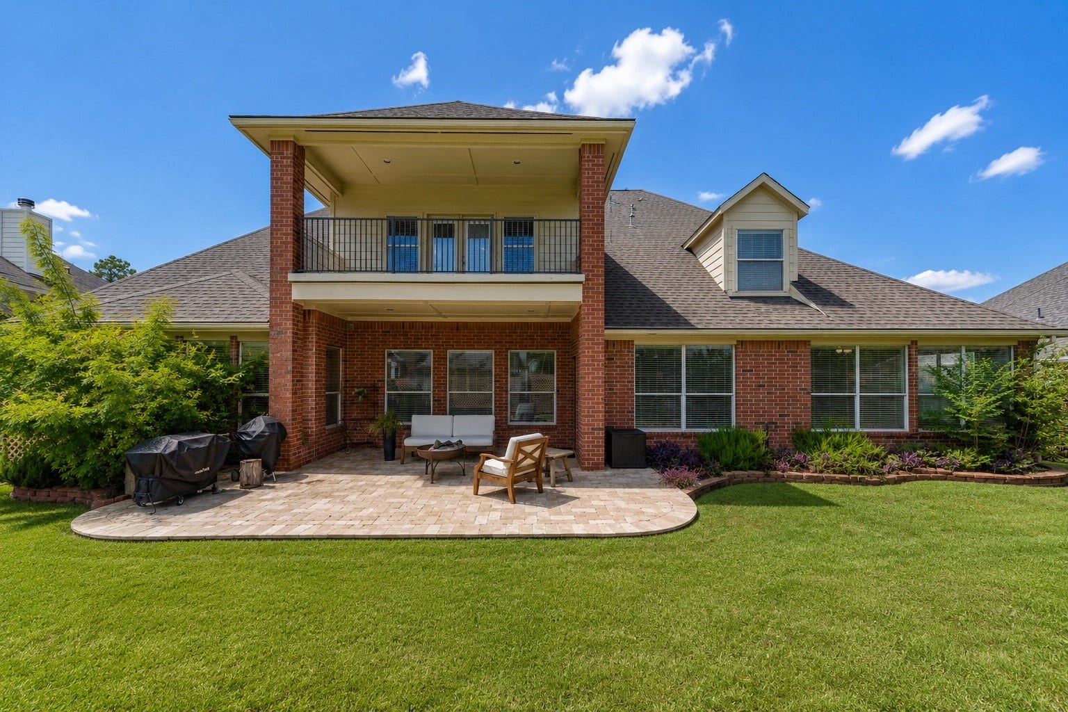 20722 Windrose Bend Drive, Spring, TX 77379 Extended covered patio + second-floor balcony for outdoor living