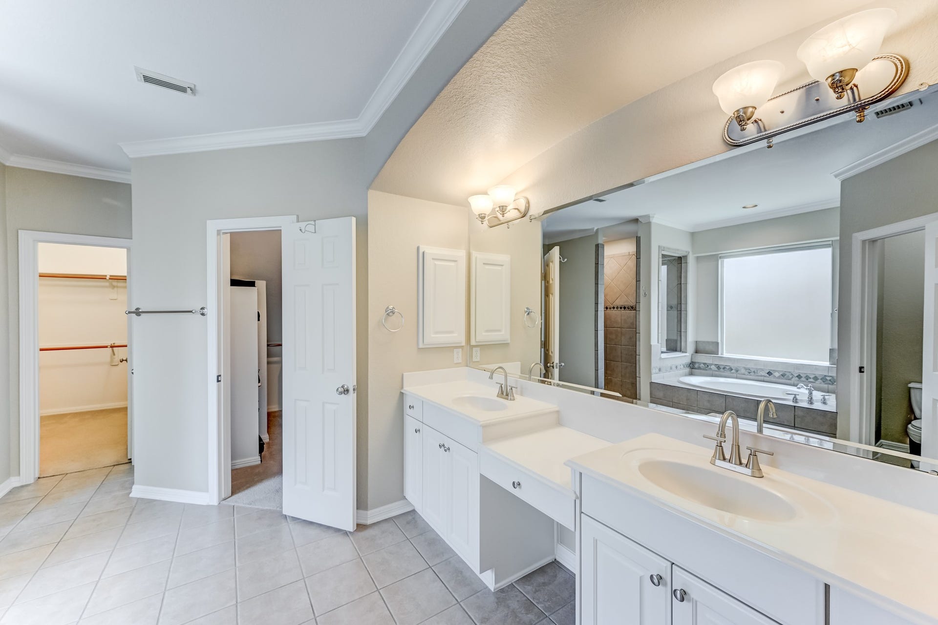 20722 Windrose Bend Drive, Spring, TX 77379 Primary bath with dual vanities & generous counter space