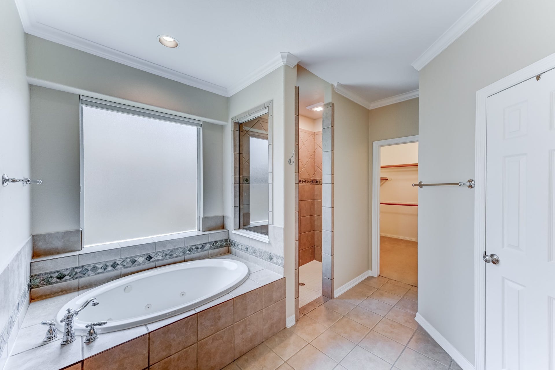 20722 Windrose Bend Drive, Spring, TX 77379 Spa-inspired primary bath with large walk-in closet