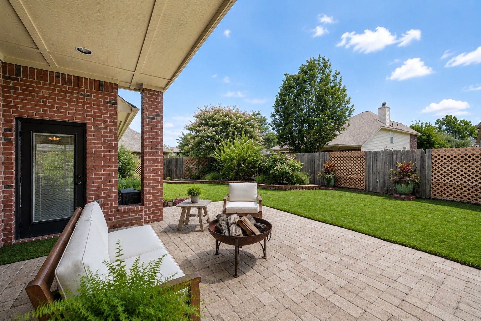 20722 Windrose Bend Drive, Spring, TX 77379 Covered outdoor living with room to dine, lounge & entertain