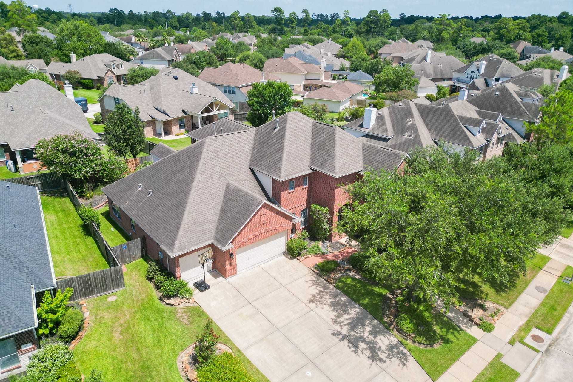 20722 Windrose Bend Drive, Spring, TX 77379 Aerial view showcases the home, lot & surrounding Windrose community