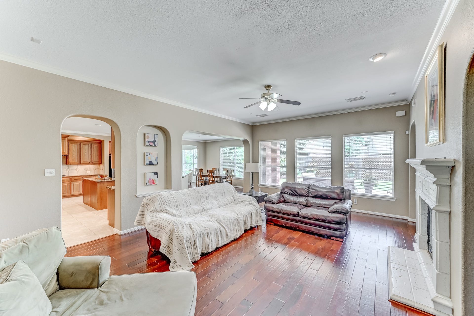 20722 Windrose Bend Drive, Spring, TX 77379 Main living room with wood flooring & abundant natural light