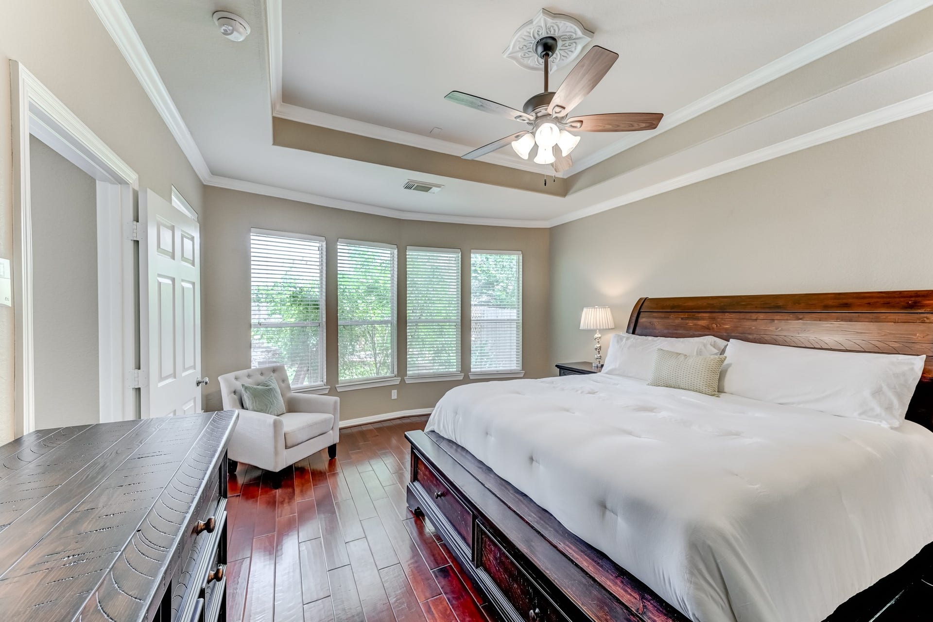 20722 Windrose Bend Drive, Spring, TX 77379 Spacious primary bedroom with backyard views & natural light