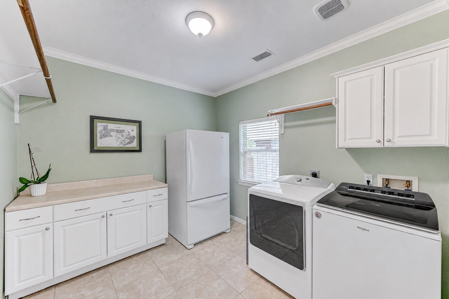 20722 Windrose Bend Drive, Spring, TX 77379 Spacious utility room with cabinetry & additional storage