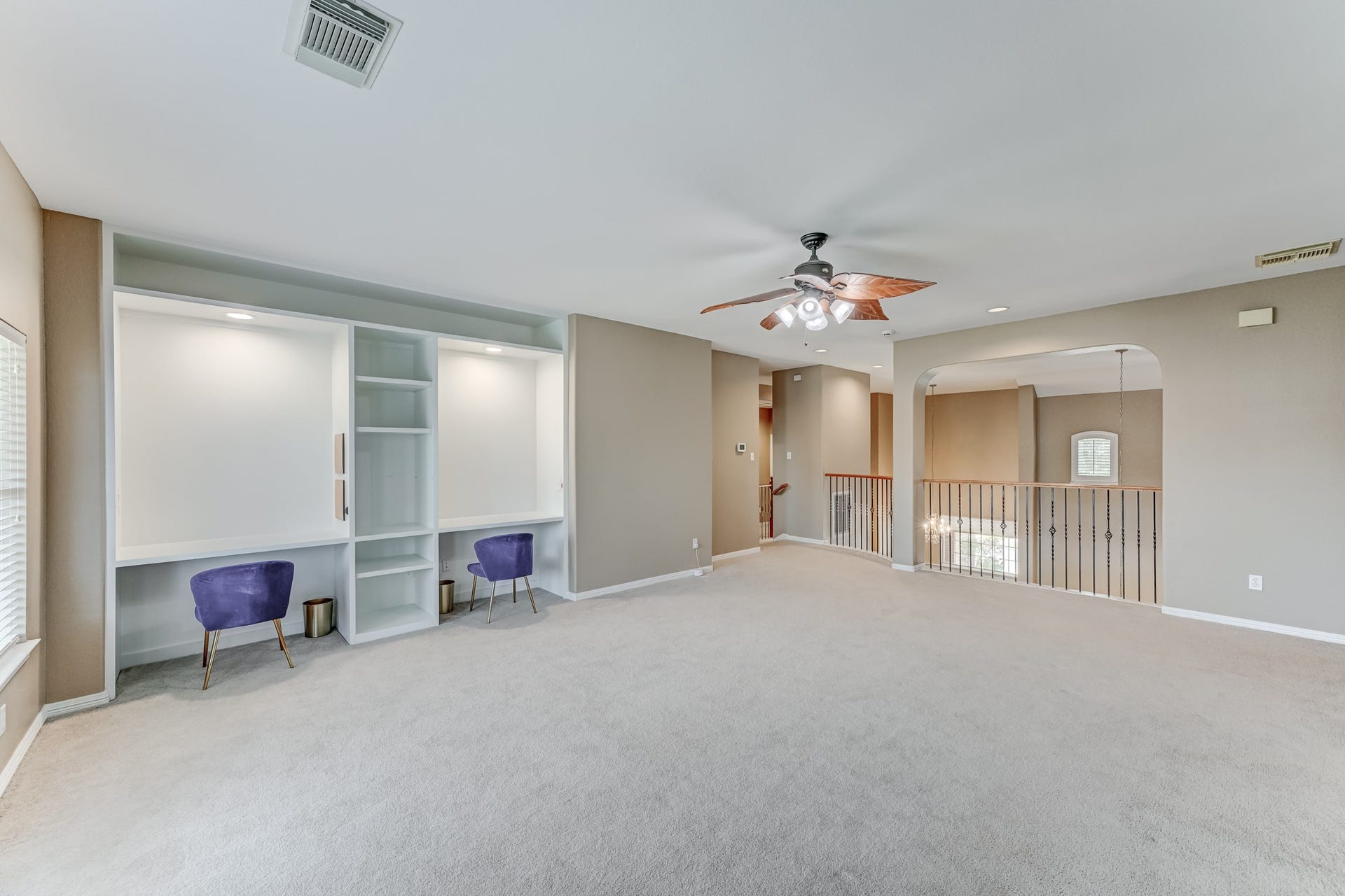 20722 Windrose Bend Drive, Spring, TX 77379 Oversized upstairs game/flex room with built-in desks