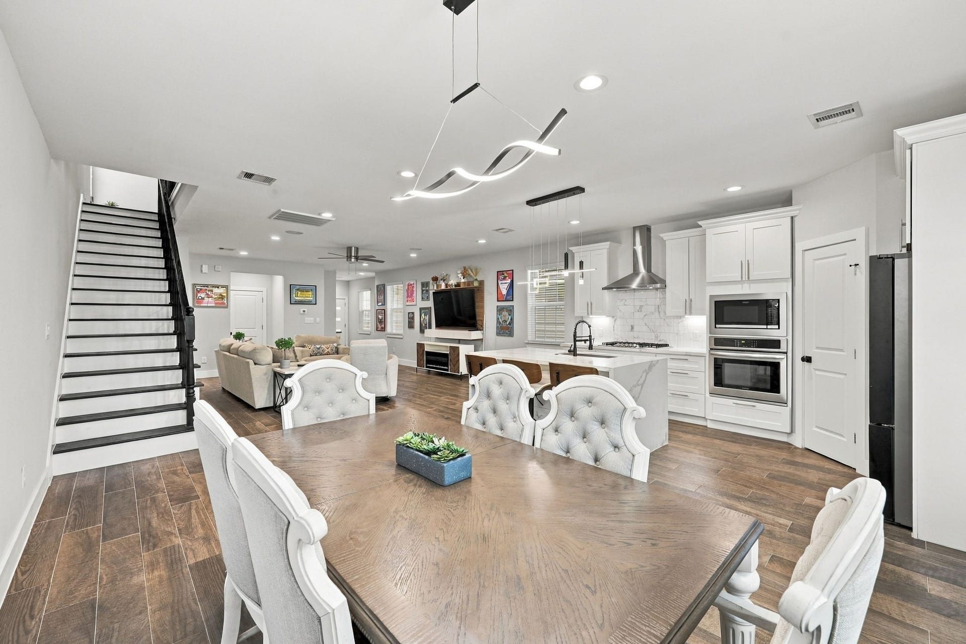 1116 Bennington Street, Houston, TX 77022 Bright dining area with abundant natural light, contemporary lighting and direct access to the backyard.