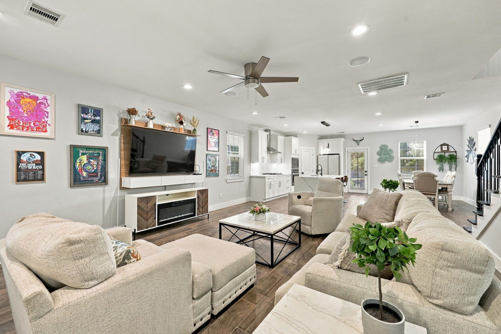 1116 Bennington Street, Houston, TX 77022 Living area flows seamlessly into the bright, modern kitchen and adjacent dining space.