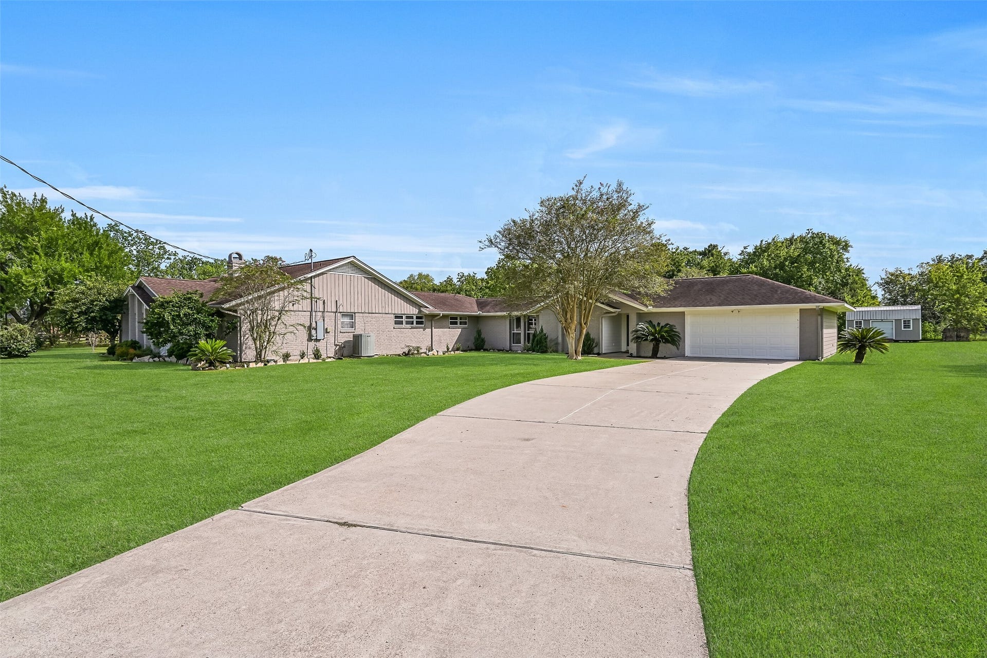 304 Chester Drive, Friendswood, TX 77546 Driveway - Second Residence:
A separate driveway extends from Chester Drive to the 2-car attached garage that services this 2-bedroom, 2-bathroom single story home.