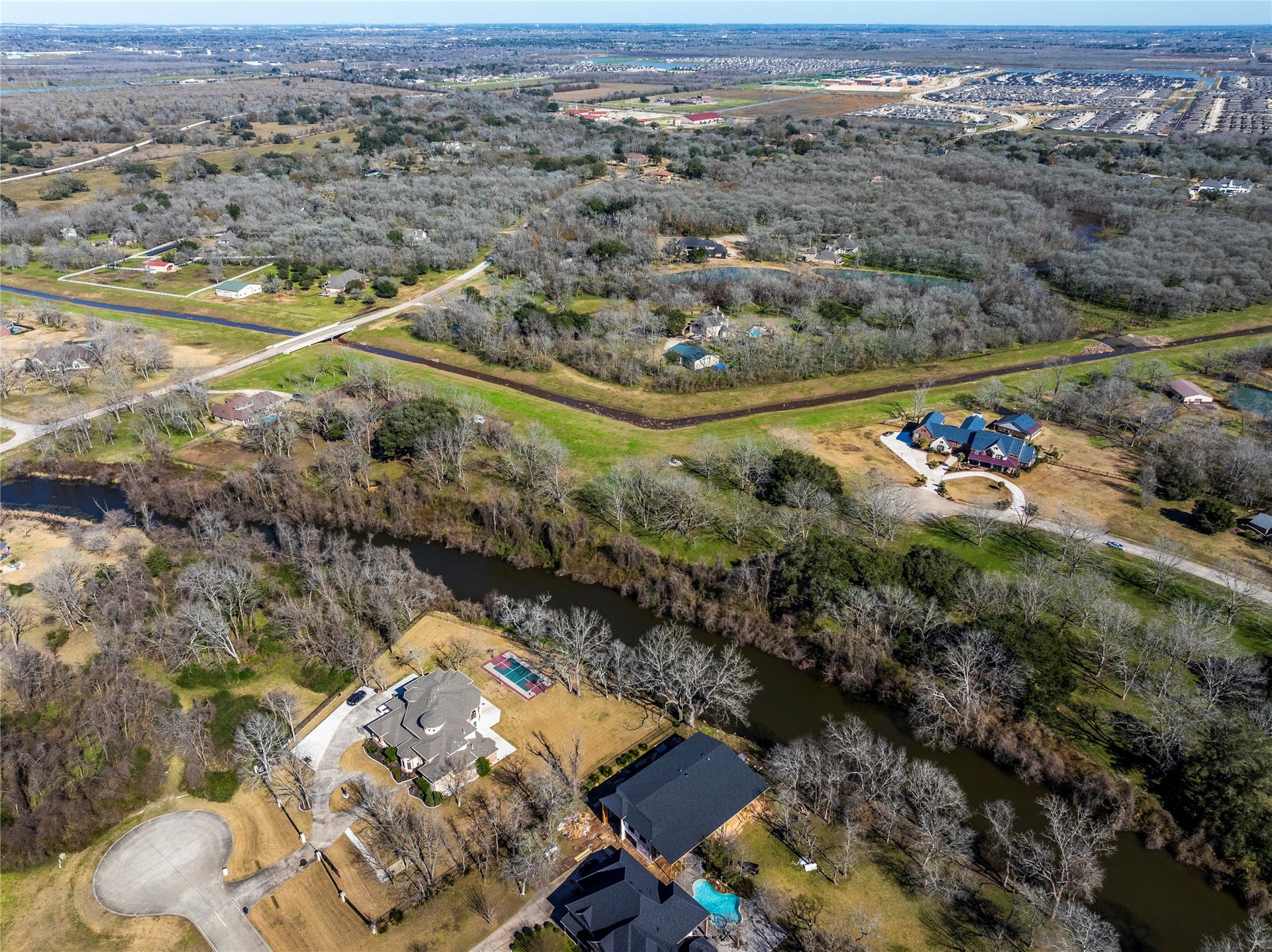 606 Oyster Shell Court, Missouri City, TX 77459 Looking across the water, you'll see that the lot is located very conveniently to Sienna