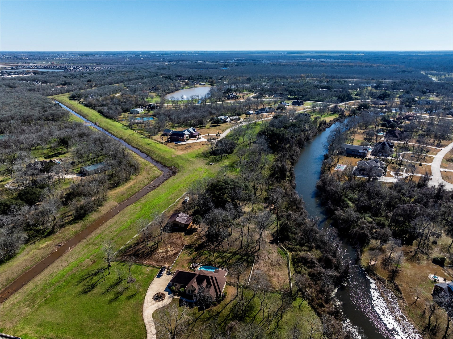 606 Oyster Shell Court, Missouri City, TX 77459 Looking back towards the lot, you'll see the lot is at one of the widest portions of the water