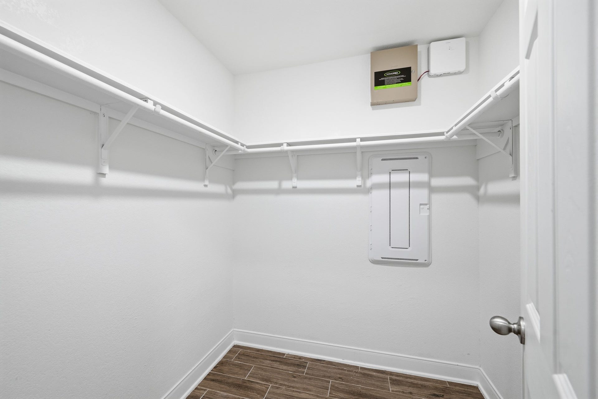 10314 Russell Pines Drive, Rosharon, TX 77583 Spacious walk-in closet with ample shelving and clean, modern design.