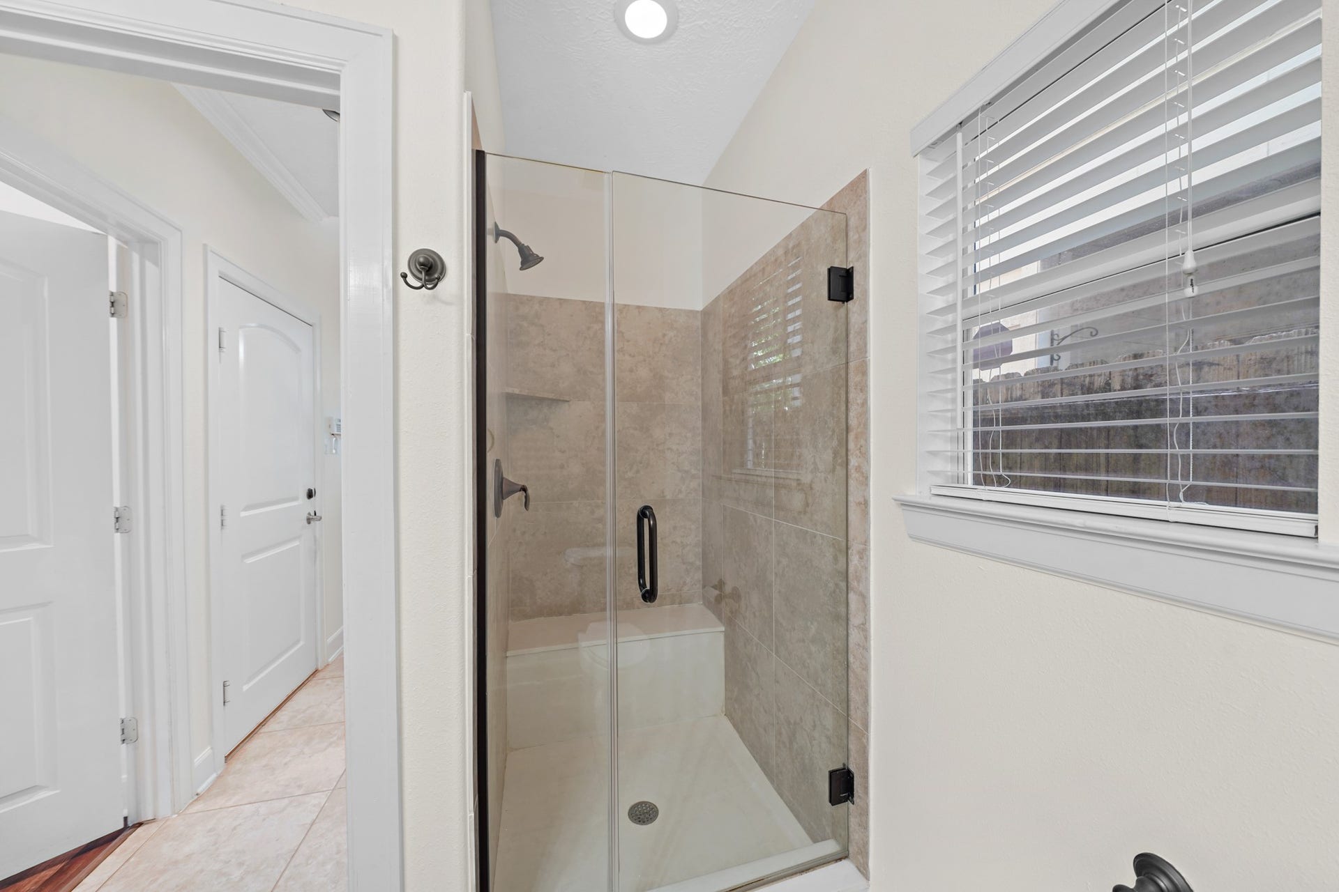 1717 Francis Street, Houston, TX 77004 This bathroom also has a gorgeous walk-in shower with a siting area.