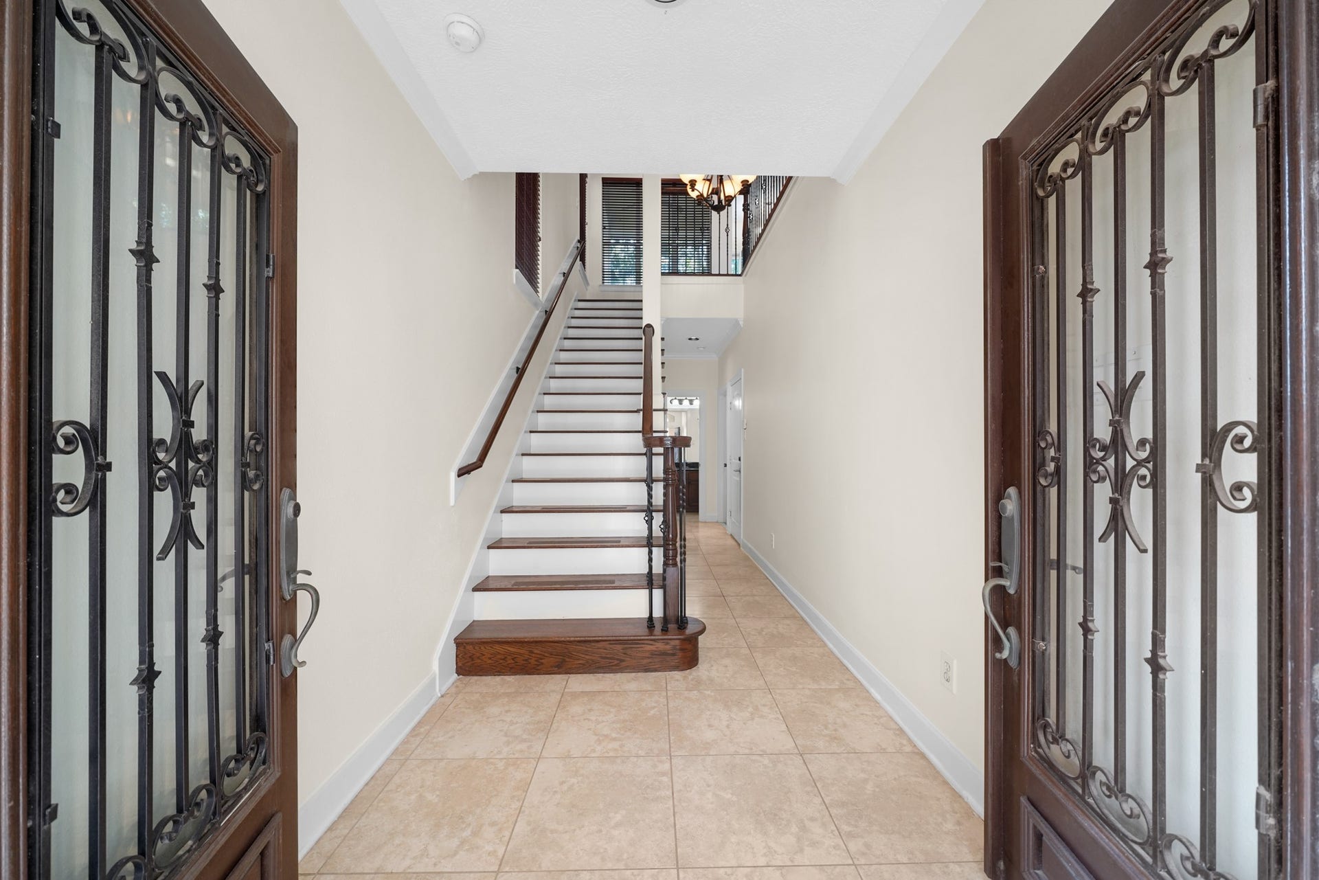 1717 Francis Street, Houston, TX 77004 You'll be instantly greeted by beautiful tile floors, and a charming stair case.