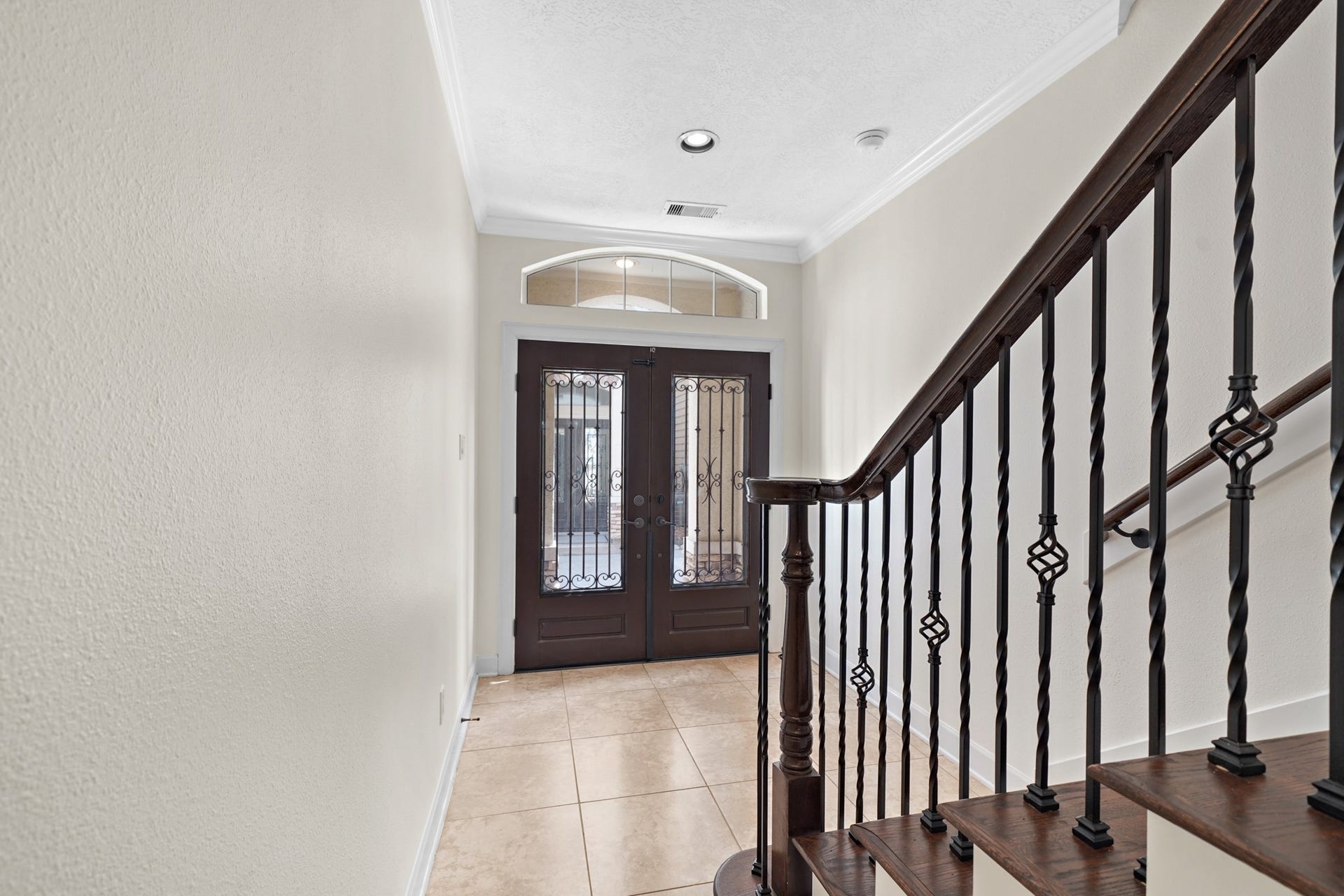 1717 Francis Street, Houston, TX 77004 You'll be instantly greeted by beautiful tile floors, and a charming stair case.