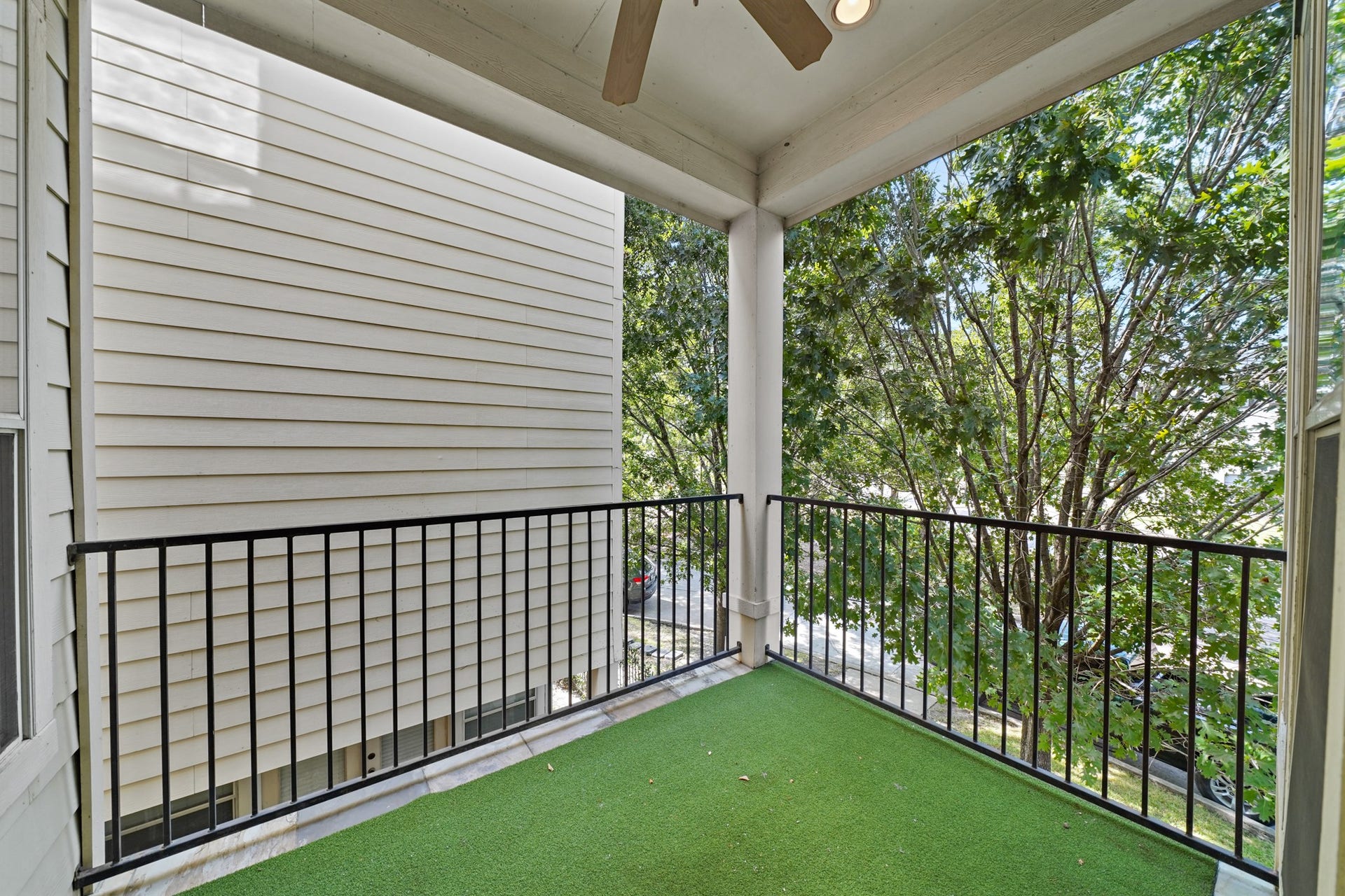 1717 Francis Street, Houston, TX 77004 Second floor balcony just outside the living room. It also has a ceiling fan.