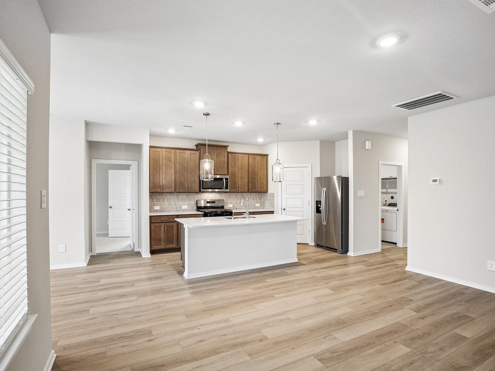 5925 Palmetto Bluff Trail, Pearland, TX 77584 Photo is not of the actual home, but is an inspirational photo of builder's model home and may depict furnishings, options, and/or decorator features that are not included.
