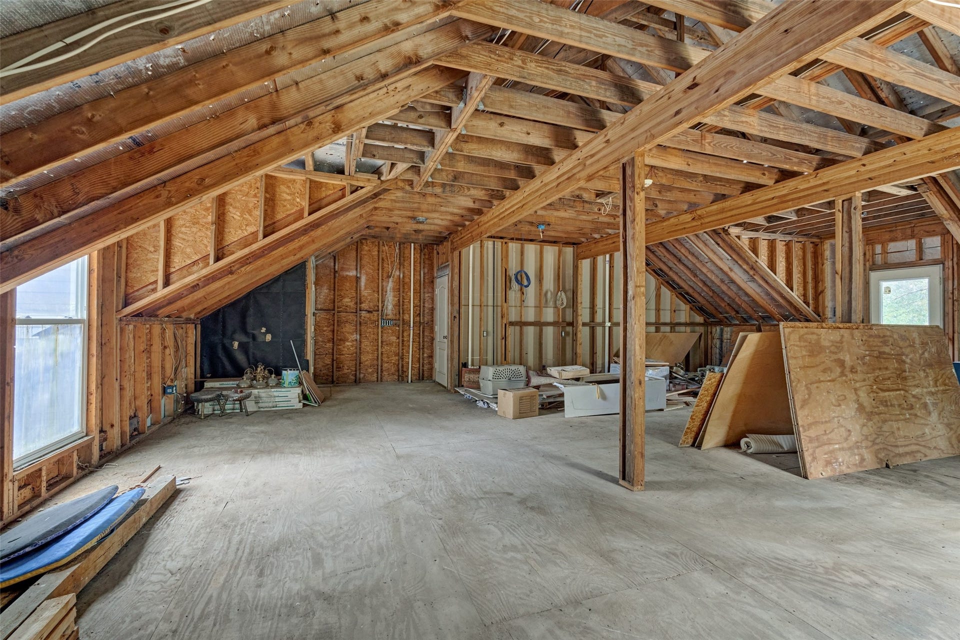 28911 Sapphire Circle, Magnolia, TX 77355 Extra 1000 square foot flex space over the garage with dual access from living room or garage. Already plumbed and wired for your build-in!
