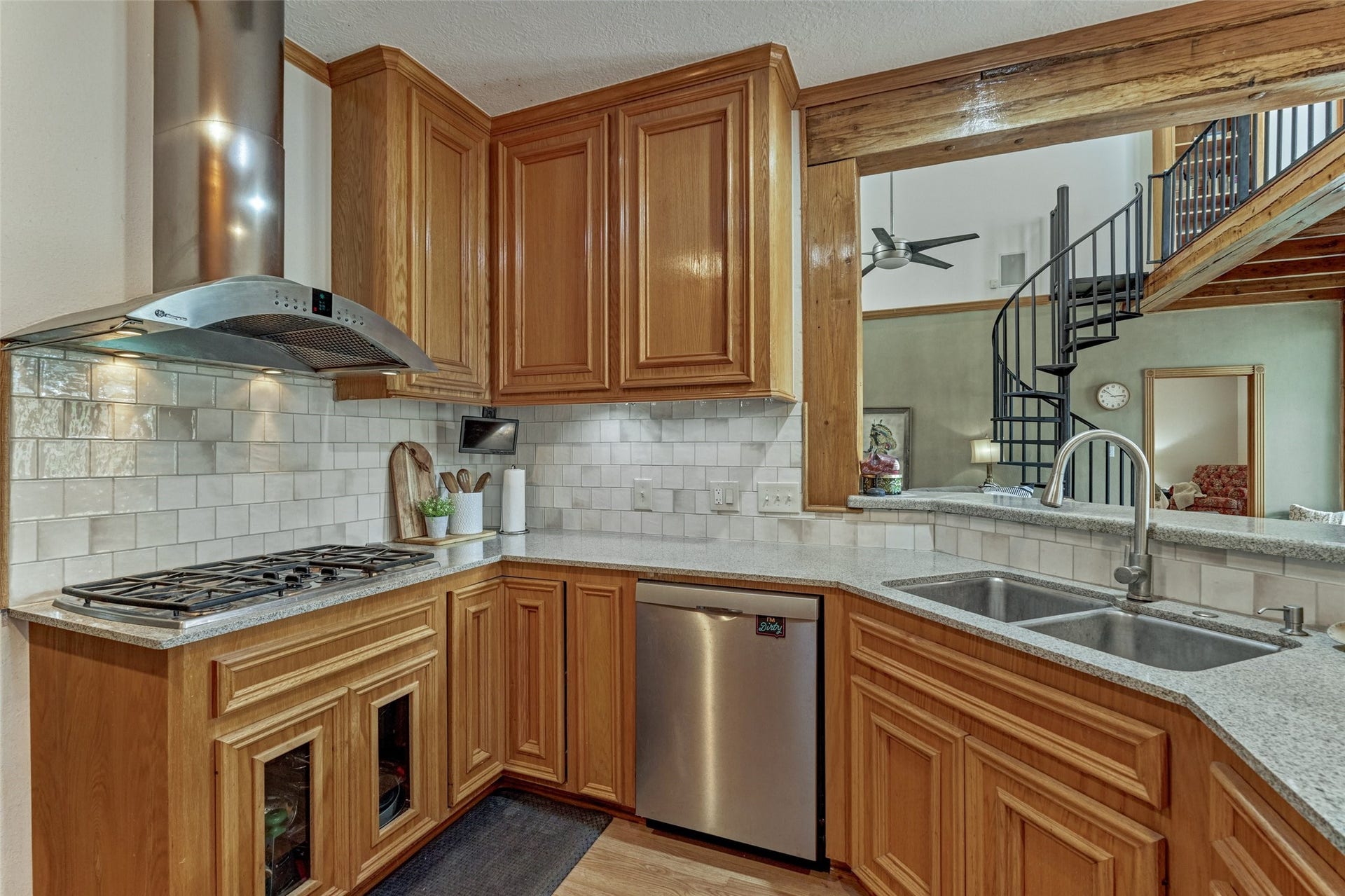 28911 Sapphire Circle, Magnolia, TX 77355 Kitchen with new zelge tile backspash open to breakfast area and living area.